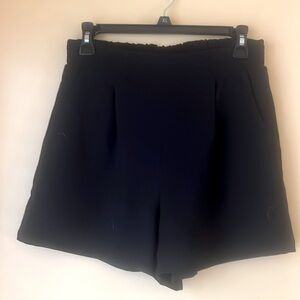 This is a SZ L simple pair of black shorts